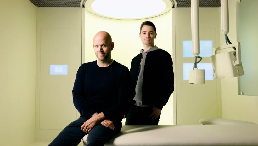 Daniel Ek, seated on the left, and Hjalmar Nilsonne, standing on the right, in the Neko Scan room.